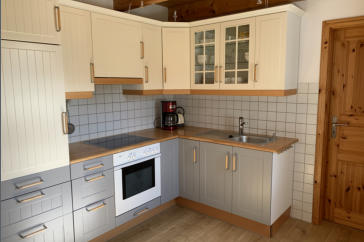 Gruenes Ferienhaus Einbaukueche